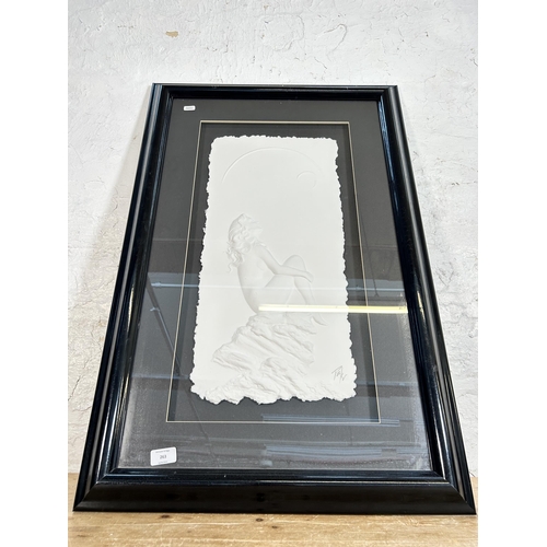 263 - A framed Roberta Peck pencil signed nude lady on rock cast paper relief - approx. 88cm high x 58cm w... 