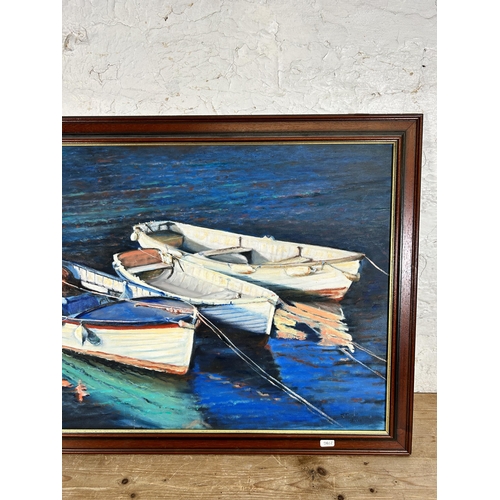 270 - A mahogany framed oil on board of three boats, signed J. Dixon and dated 2008 - approx. 59cm high x ... 