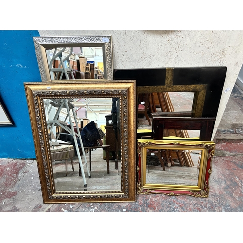 274 - Five wall mirrors to include 19th century style gilt and red lacquered framed etc.