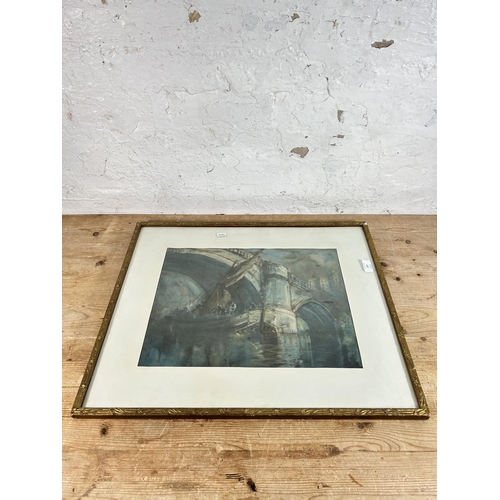 277 - A mid 20th century framed print of a boat and bridge scene - approx. 53cm high x 63cm wide