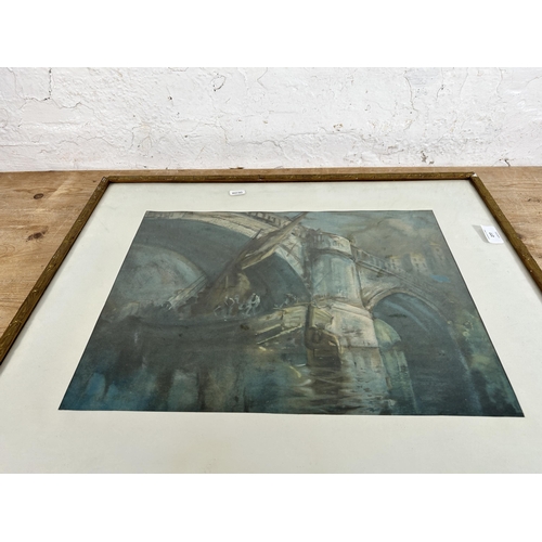 277 - A mid 20th century framed print of a boat and bridge scene - approx. 53cm high x 63cm wide