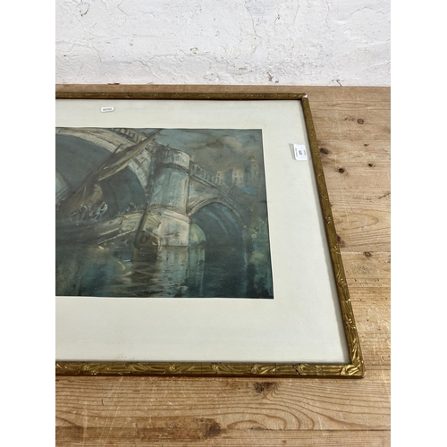 277 - A mid 20th century framed print of a boat and bridge scene - approx. 53cm high x 63cm wide