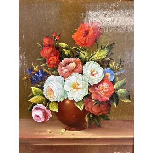 284 - A framed Gyula Kadas floral still life oil on board signed lower right - approx. 44cm high x 38cm wi... 