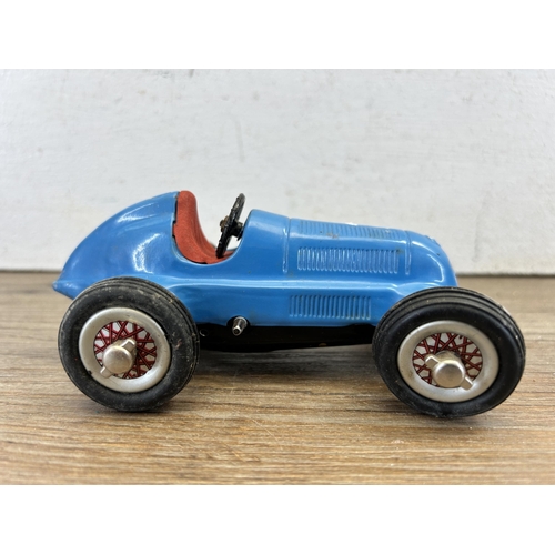 523 - A mid 20th century Schuco Studio 1050 Mercedes Grand Prix tin plate clockwork model vehicle