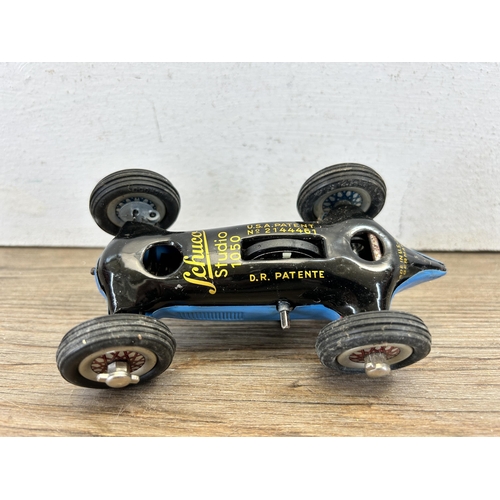 523 - A mid 20th century Schuco Studio 1050 Mercedes Grand Prix tin plate clockwork model vehicle