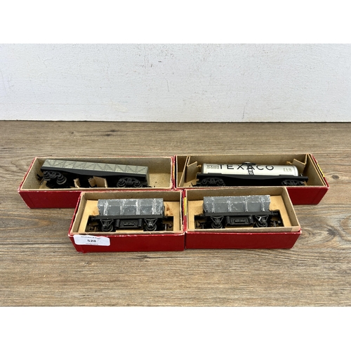 528 - Four boxed mid 20th century Trix twin railway model locomotives, two operating dump wagons, one Gond... 