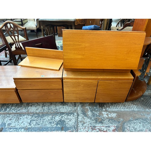 143 - Six pieces of 1970s teak lounge furniture