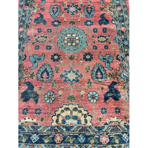 180 - A vintage hand woven rug - approx. 155cm x 98cm