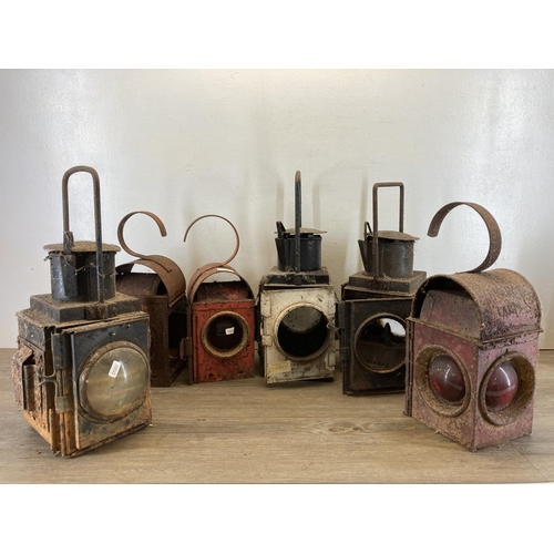 604 - Six vintage metal cased railway lanterns - largest approx. 49cm high