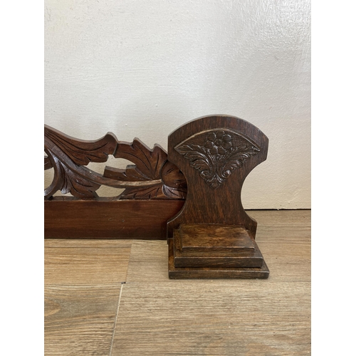 611 - An Edwardian carved mahogany and oak wall panel - approx. 22cm high x 114cm long