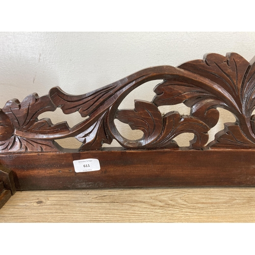 611 - An Edwardian carved mahogany and oak wall panel - approx. 22cm high x 114cm long