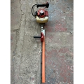 A Zenoah HT2300 petrol hedge cutter
