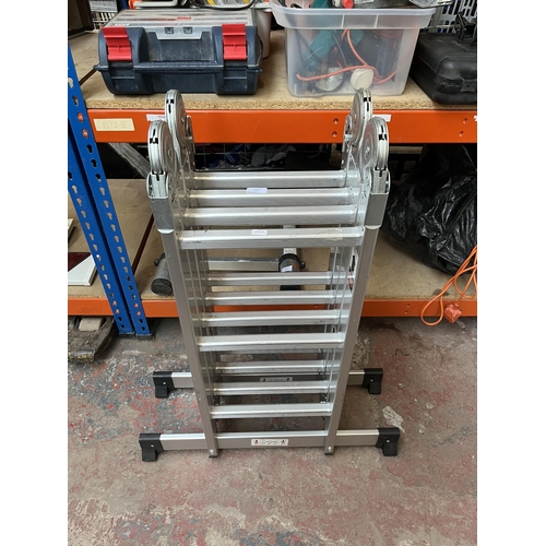 955 - A set of aluminium folding step ladders