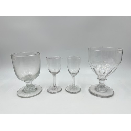 307 - Four Georgian drinking glasses - largest approx. 12.5cm high