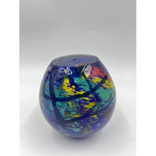 309 - Five art glass paperweights to include three Mdina, Langham Glass etc.