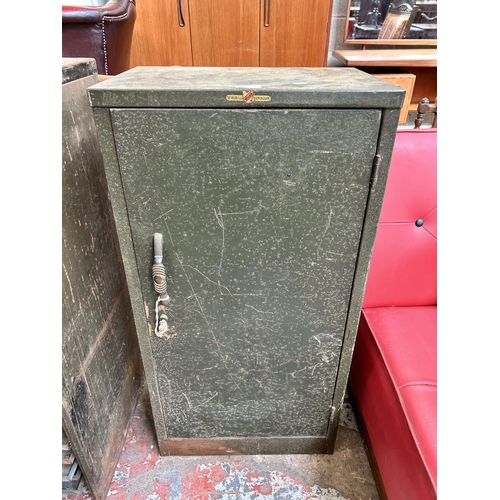 38 - A mid 20th century Valor military green metal single door cabinet