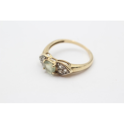 2003 - A 9ct gold white and green gemstone dress ring - approx. gross weight 2.2g