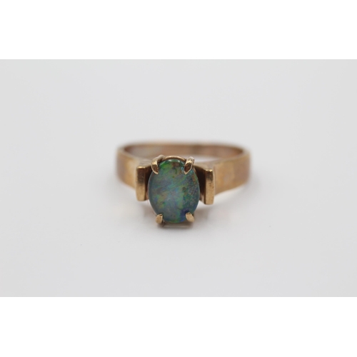 2005 - A 9ct gold opal triplet solitaire ring, size O - approx. gross weight 4.1g