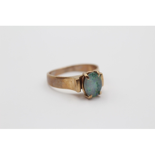 2005 - A 9ct gold opal triplet solitaire ring, size O - approx. gross weight 4.1g