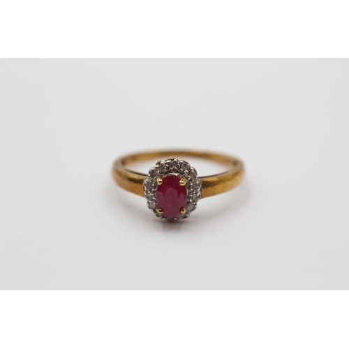 2008 - A 9ct gold ruby and diamond halo ring - approx. gross weight 1.9g