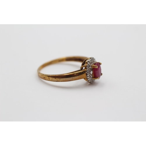 2008 - A 9ct gold ruby and diamond halo ring - approx. gross weight 1.9g