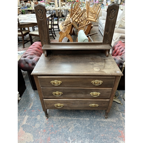 224 - An Edwardian satinwood dressing chest with three drawers and upper bevelled edge mirror