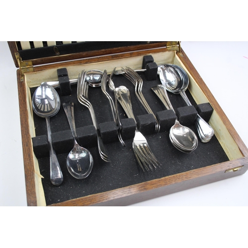 470 - A boxed vintage silver plated thirty nine piece canteen of cutlery