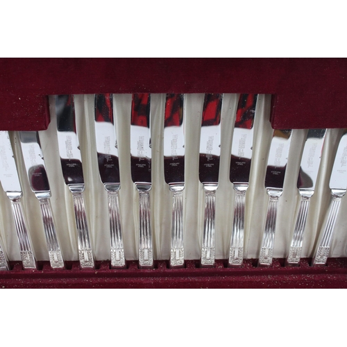 473 - A vintage silver plated sixty three piece canteen of cutlery