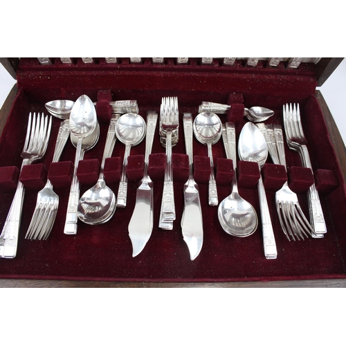 473 - A vintage silver plated sixty three piece canteen of cutlery