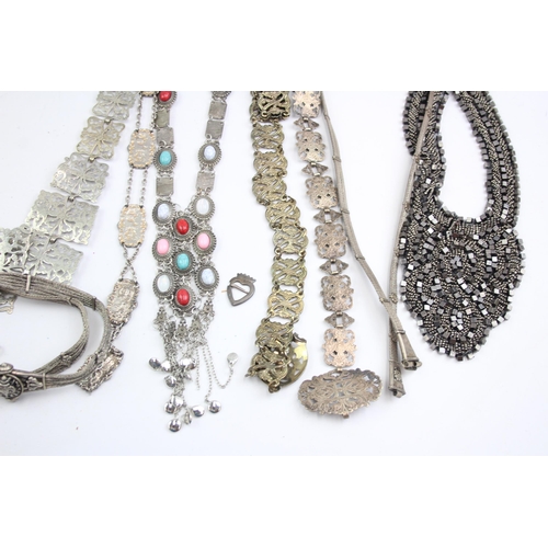 544 - Sixteen antique and vintage fashion accessories to include belts, necklaces etc.