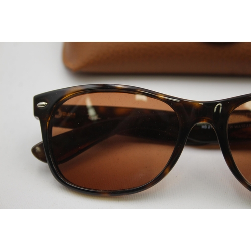 552 - A pair of Ray-Ban Wayfarer faux tortoiseshell sunglasses with original case