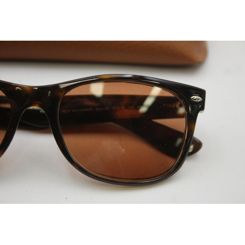 552 - A pair of Ray-Ban Wayfarer faux tortoiseshell sunglasses with original case