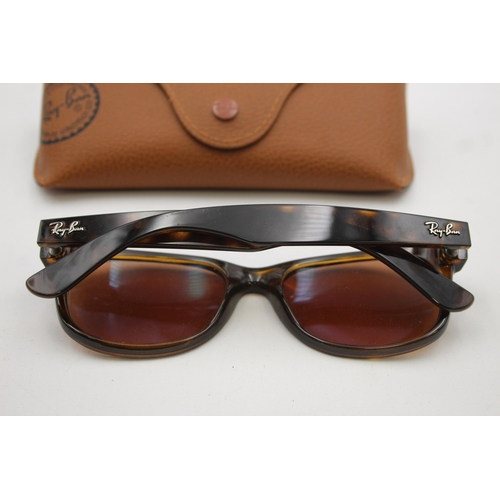 552 - A pair of Ray-Ban Wayfarer faux tortoiseshell sunglasses with original case