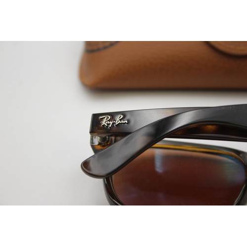 552 - A pair of Ray-Ban Wayfarer faux tortoiseshell sunglasses with original case