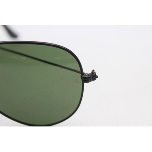 555 - A pair of cased Ray-Ban Aviator sunglasses