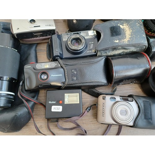 681 - A collection of camera equipment to include Canon Canovision EX1 Hi8 camcorder fitted with CL 8-120m... 