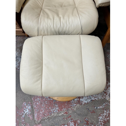 111 - A Stressless style cream leather and bentwood swivel reclining armchair and footstool