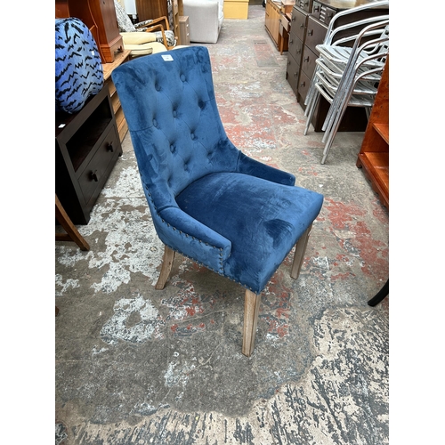 118 - A Rowico blue fabric upholstered button back dining chair