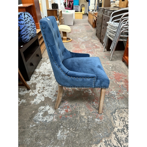 118 - A Rowico blue fabric upholstered button back dining chair