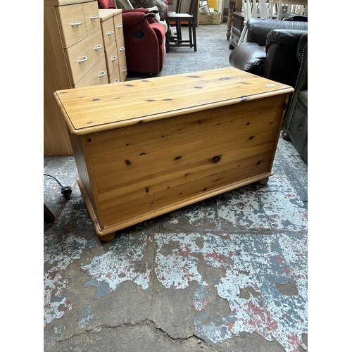 131 - A pine blanket box - approx. 47cm high x 84cm wide x 39cm deep