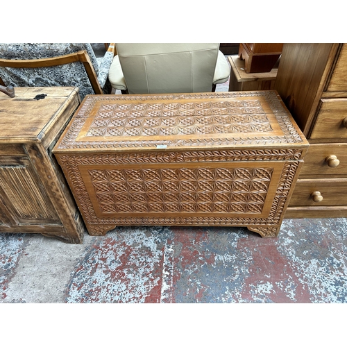 134 - An African carved cedar wood blanket box