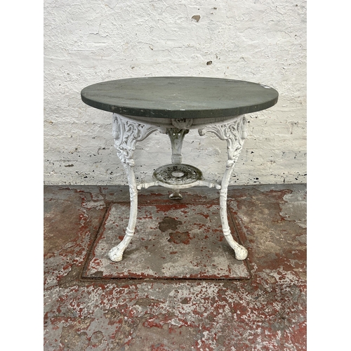 164 - A Victorian Freegate Metals, Cowling Yorks white painted cast metal pub table with later added circu... 