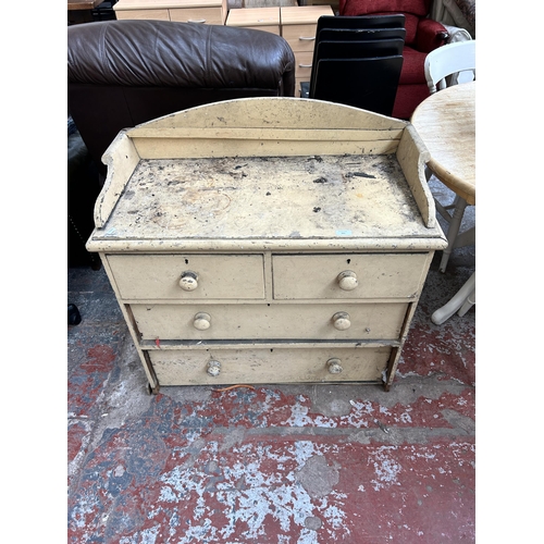 165 - A Victorian painted pine chest of two short over two long drawers