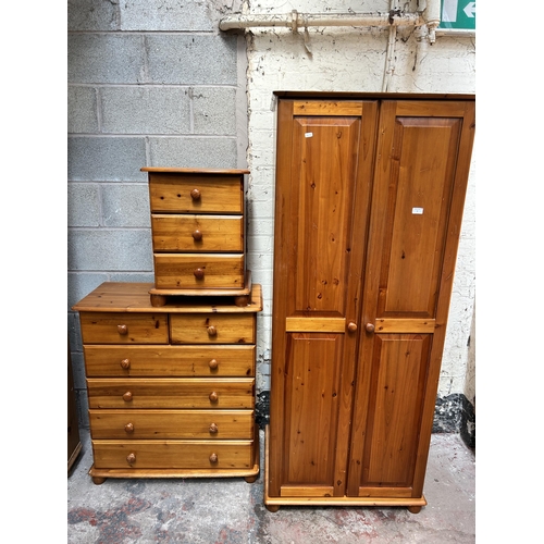 2 - A pine three piece bedroom suite comprising chest of two short over four long drawers, bedside chest... 
