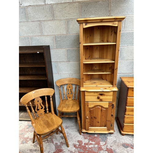 3 - Three pieces of furniture, two beech spindle back farmhouse dining chairs and one pine corner cabine... 
