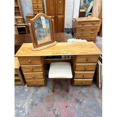 32 - A pine dressing table with mirror and stool