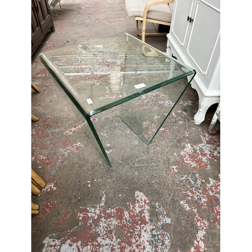 44 - A contemporary bevelled glass side table