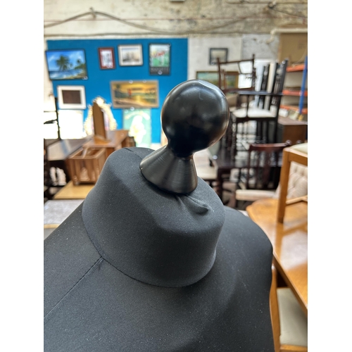 62 - A black fabric male mannequin on stand - approx. 153cm high