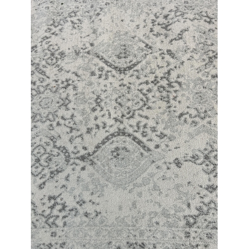 80 - A Nuloom Bodrum ivory rug - approx. 7' 5'' x 5'