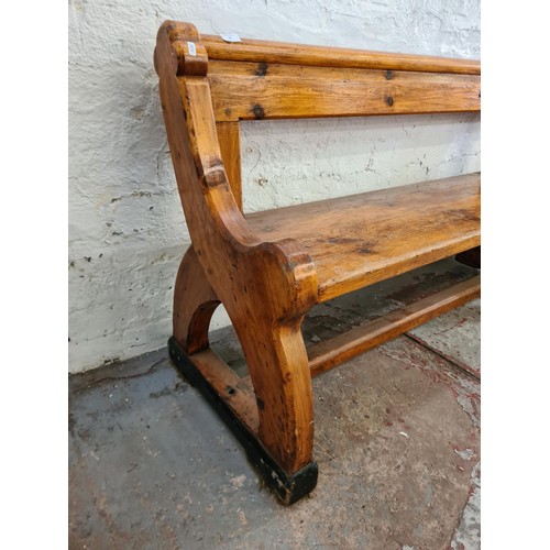 245 - A 19th century Augustus Pugin style pine church pew - approx. 80cm high x 265cm long x deep